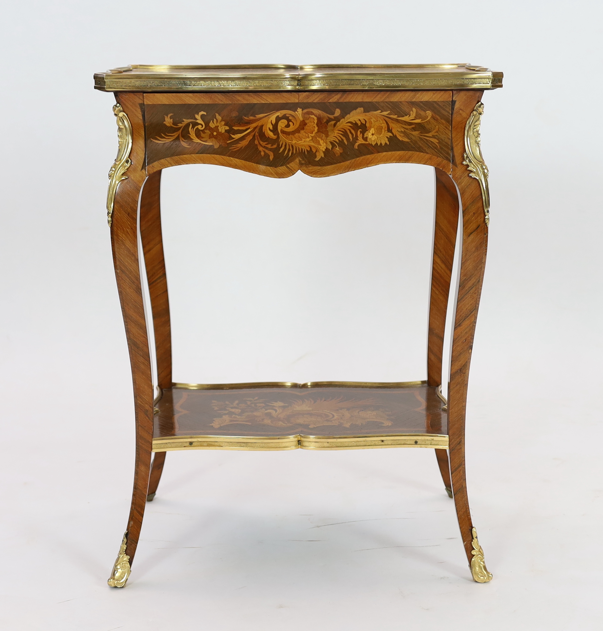 A Louis XV style ormolu mounted marquetry side table, 56cm wide, 38cm deep, 75cm high, Please note this lot attracts an additional import tax of 5% on the hammer price